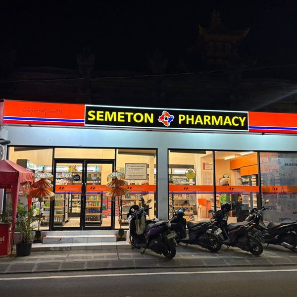 Semeton Pharmacy lit up in the evening